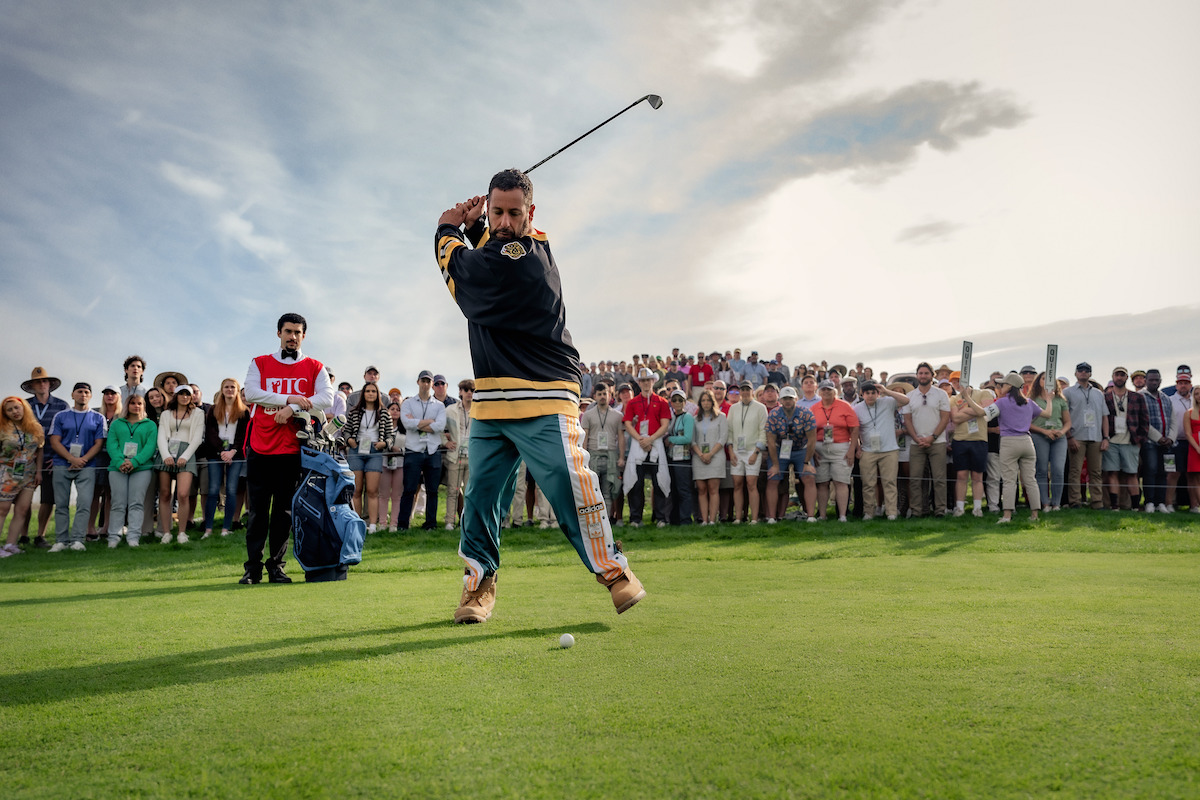 Benito Antonio Martínez Ocasio as Busboy and Adam Sandler as Happy Gilmore in ‘Happy Gilmore 2’