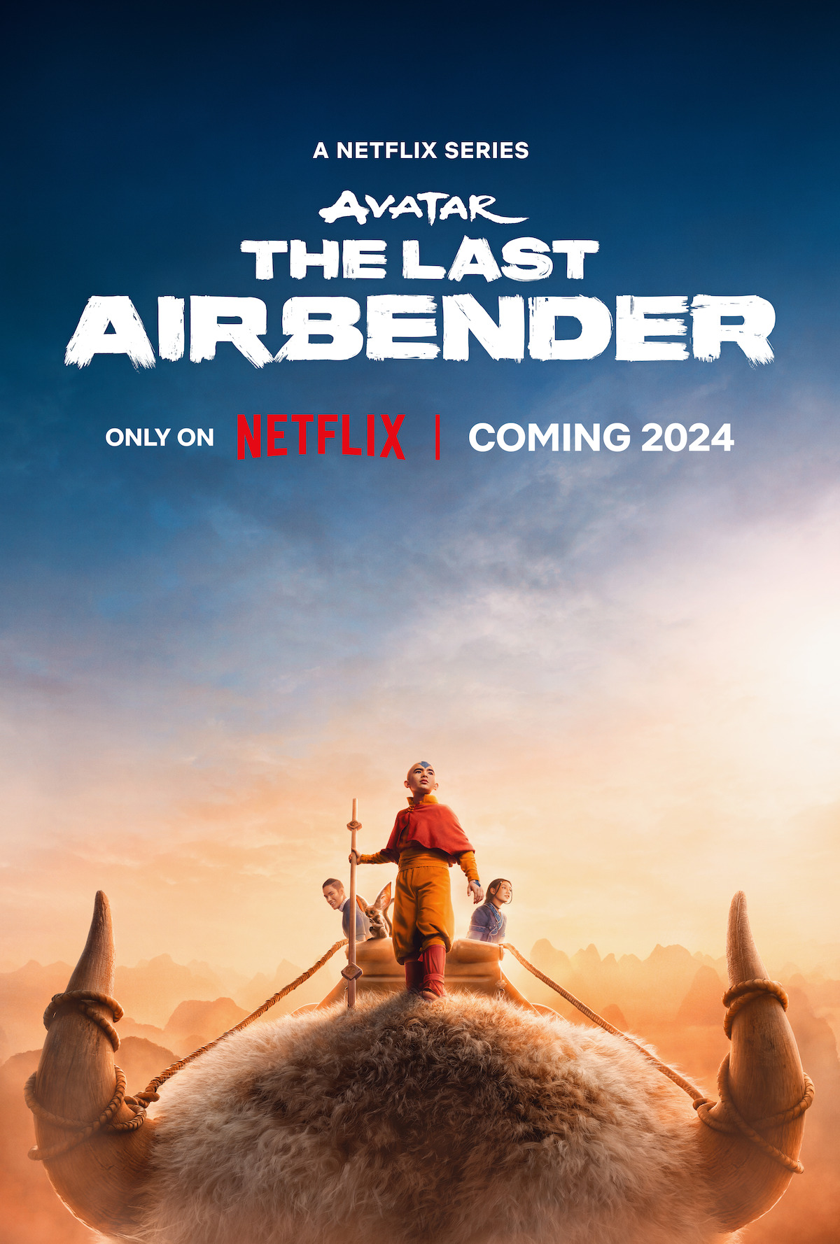 Gordon Cormier as Aang rides Appa in this key art for Season 1 of 'Avatar: The Last Airbender'