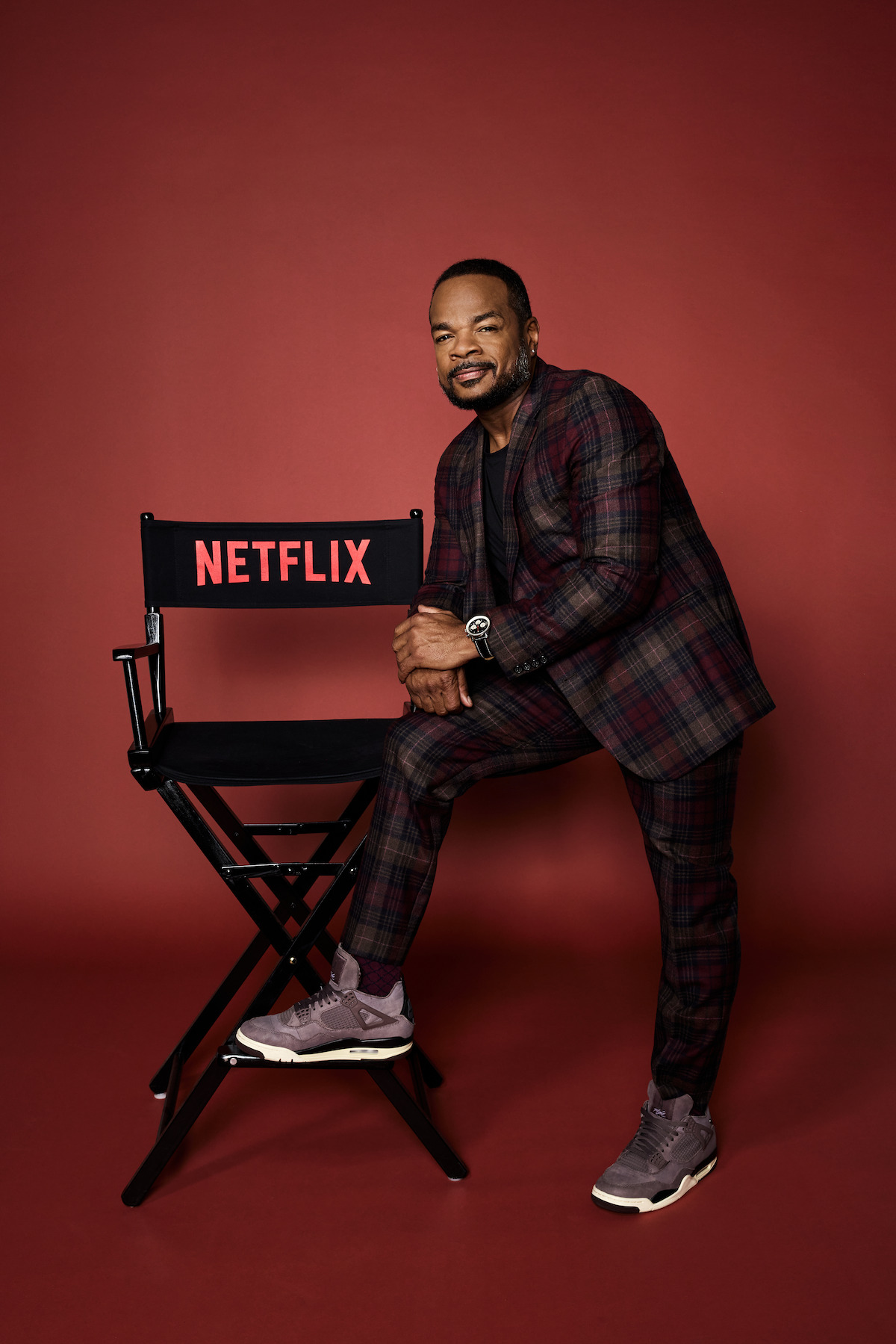 Director F. Gary Gray leans against a chair.