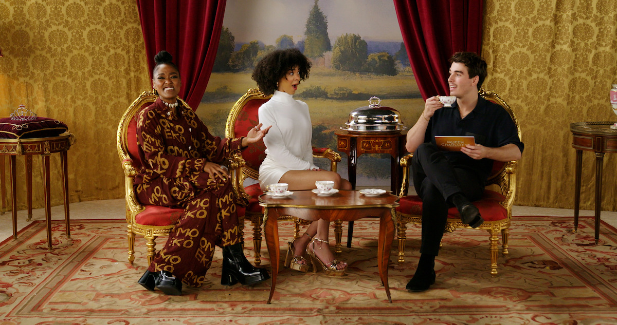 India Amarteifio, Corey Mylchreest, and Arsema Thomas sip tea.