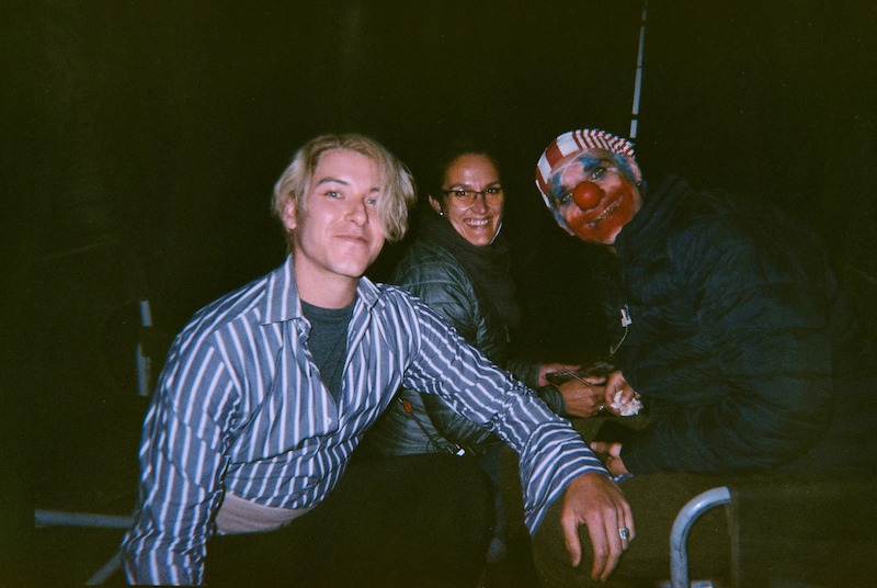 Taz Skylar as Sanji, hair and makeup designer Amanda Ross-McDonald, and Jeff Ward as Buggy the Clown on the set of Season 1 of 'One Piece.'