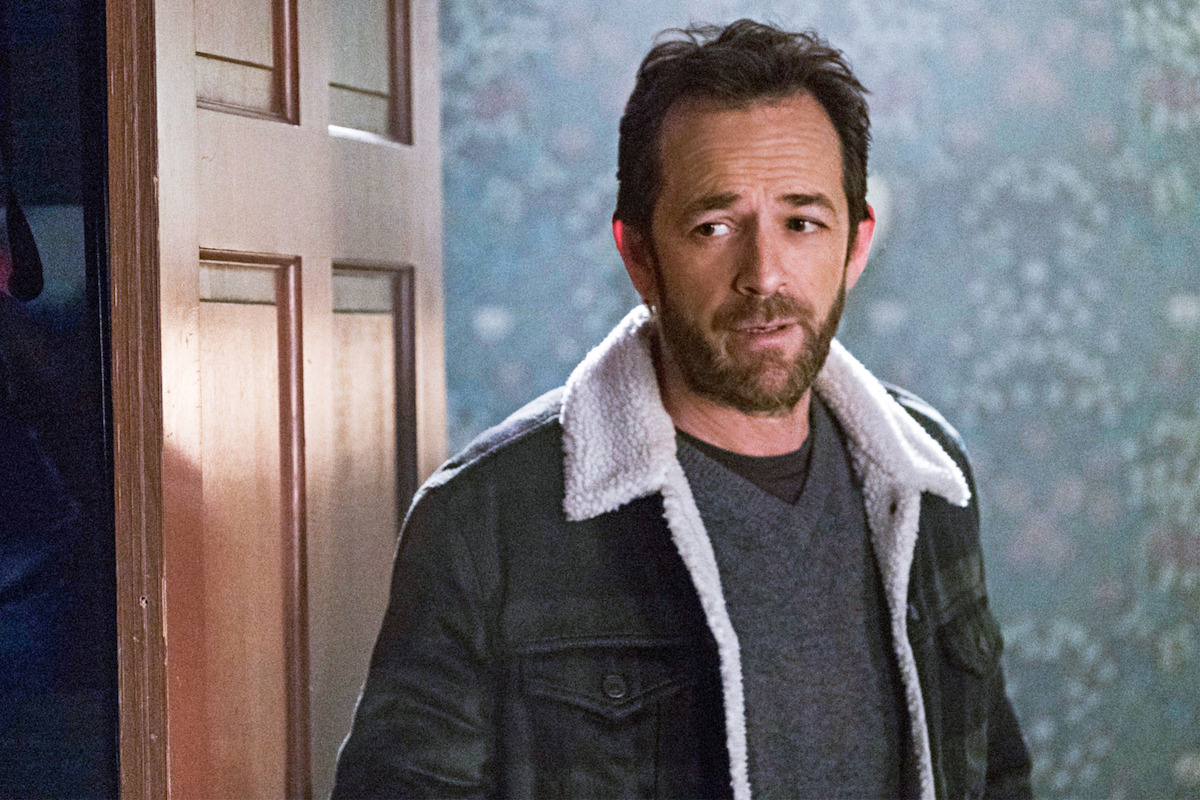 Luke Perry as Fred Andrews stands in a doorway in Season 1 of ‘Riverdale.’