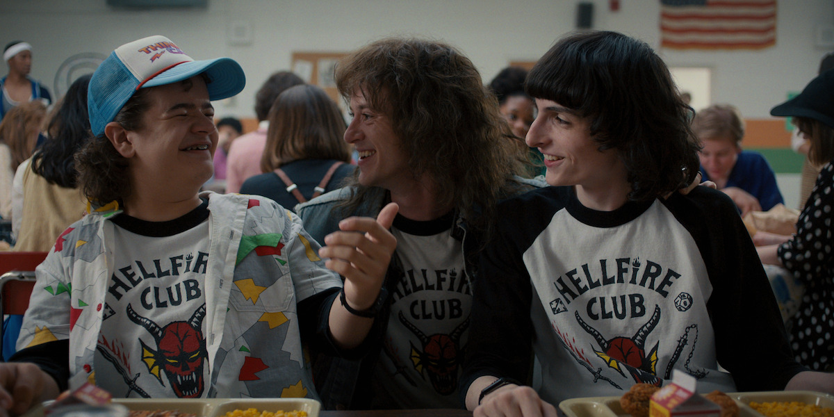 Joe Quinn’s Eddie Munson revving up his Hellfire mentees Dustin Henderson and Mike Wheeler - Joe Quinn Puts the Fire in Hellfire as Eddie Munson on ‘Stranger Things’