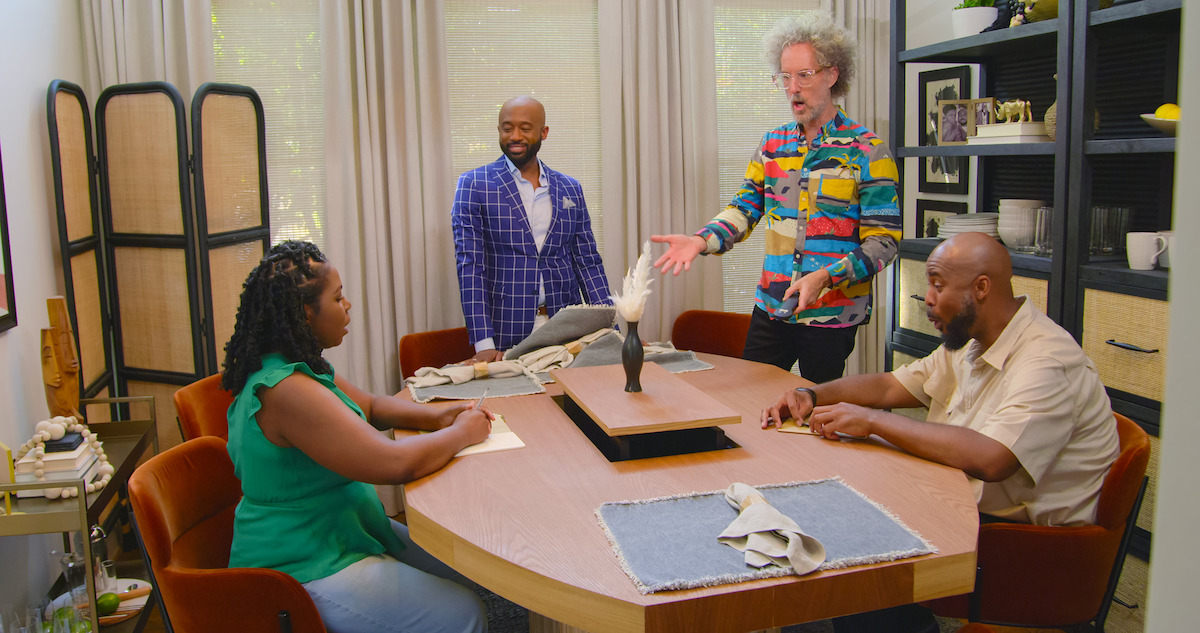 Hosts of show talking to participants about their living space