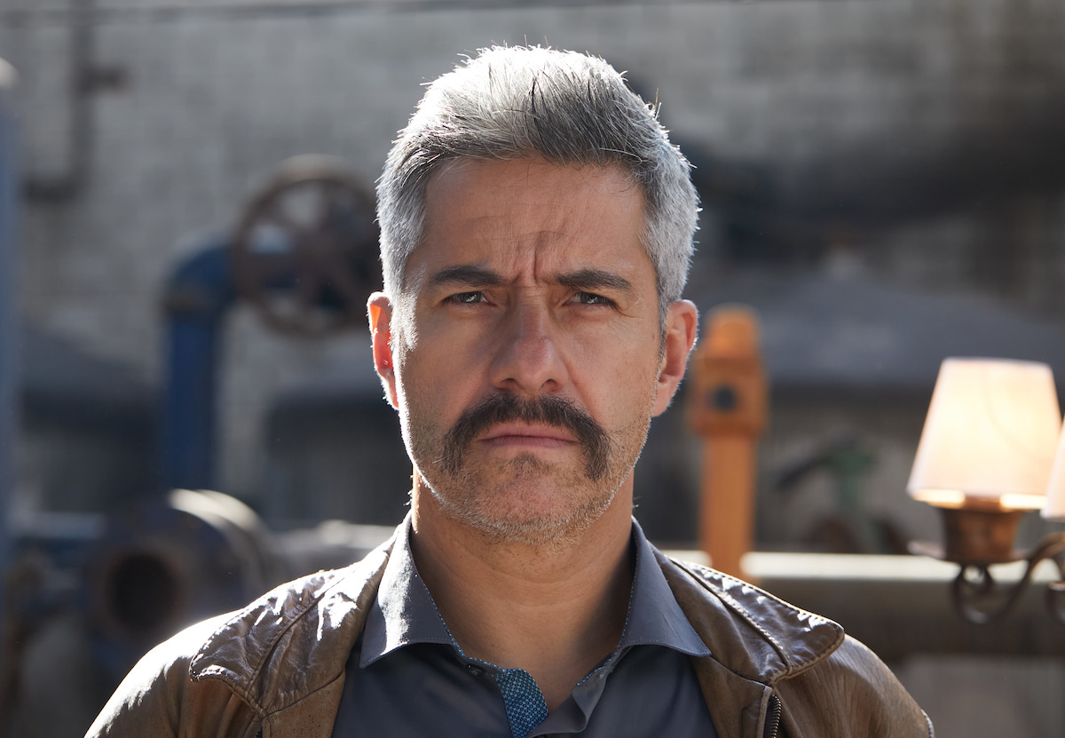 Man with gray hair and mustache