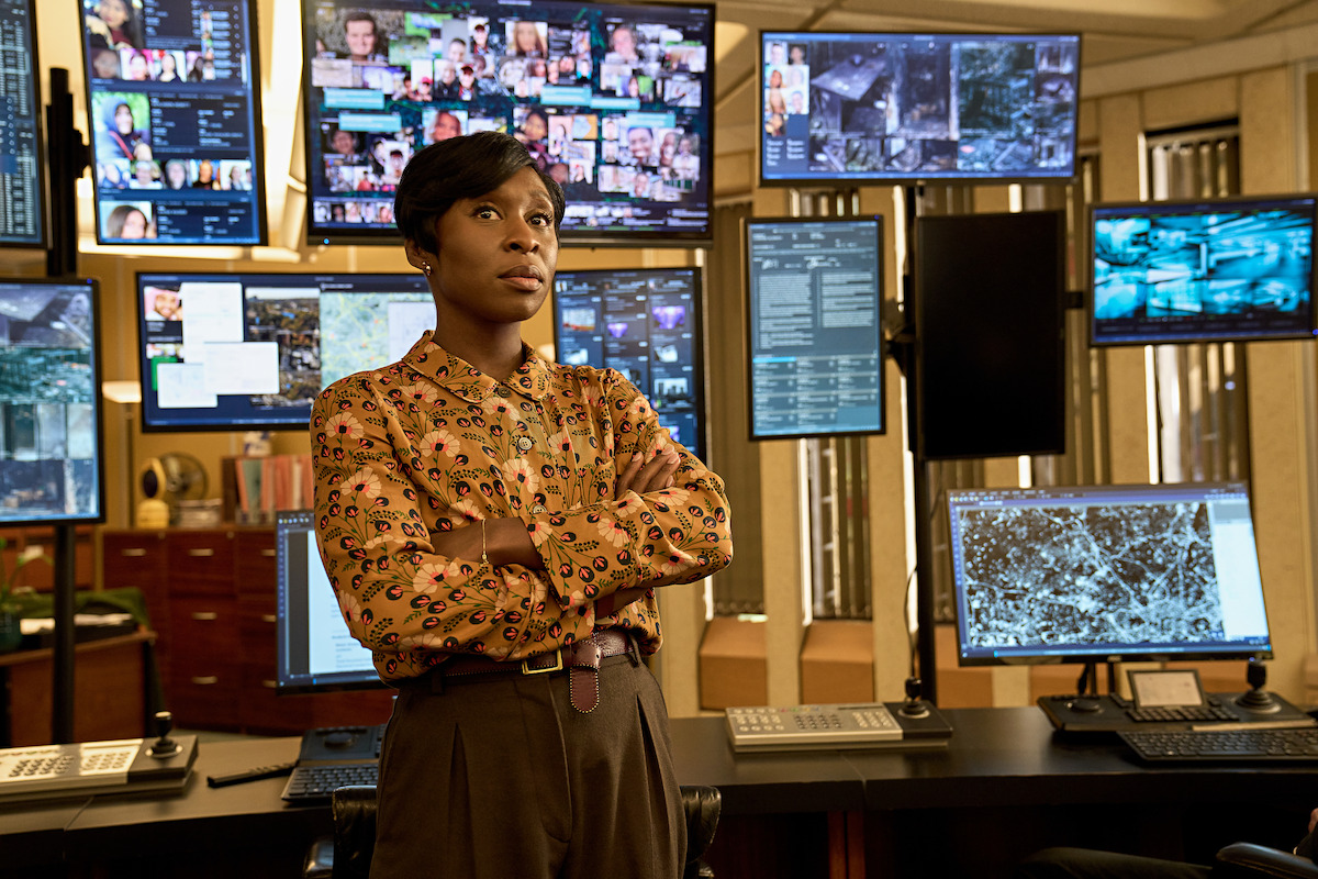 DCI Raine in a room with screens