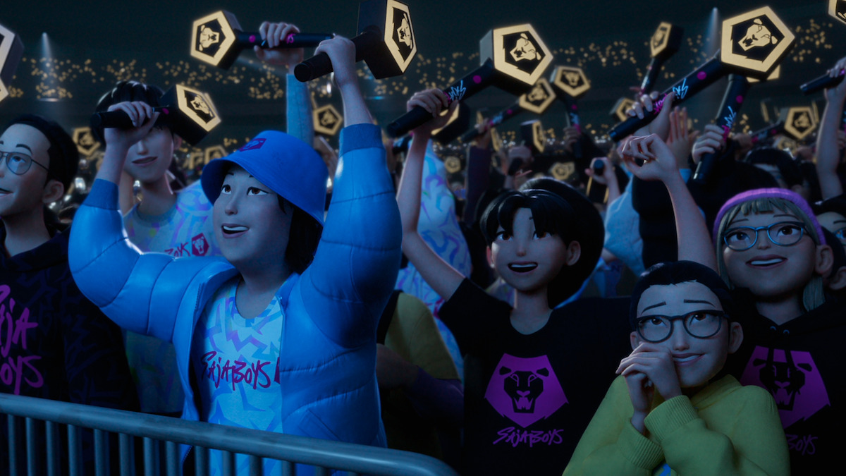 Fans hold Saja Boys light sticks in ‘KPop Demon Hunters.’