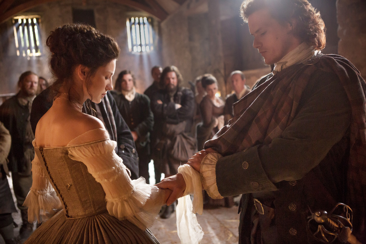 Jamie and Claire at their wedding on Outlander
