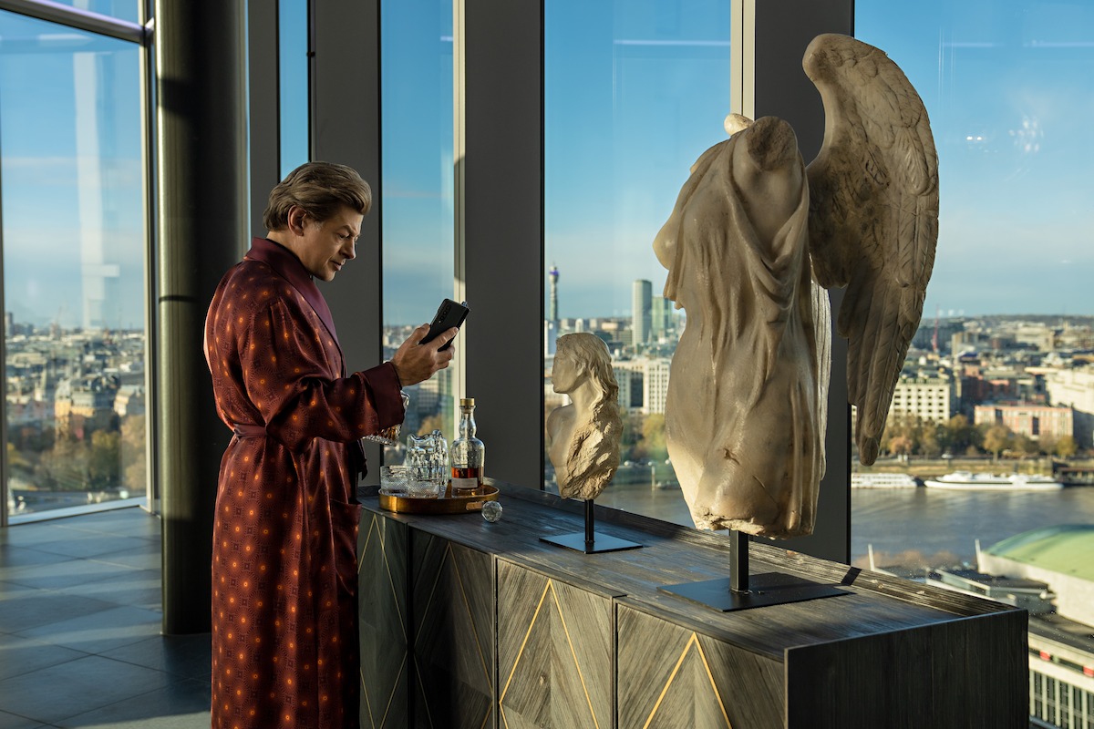 David Robey standing in a loft overlooking The River Thames
