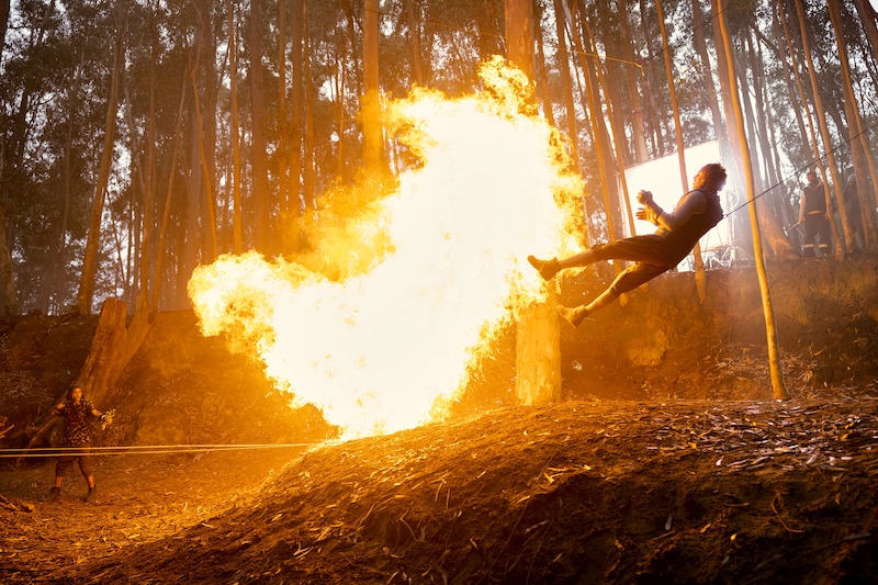 Stunt scene with fire on the set of Season 1 of 'One Piece.'