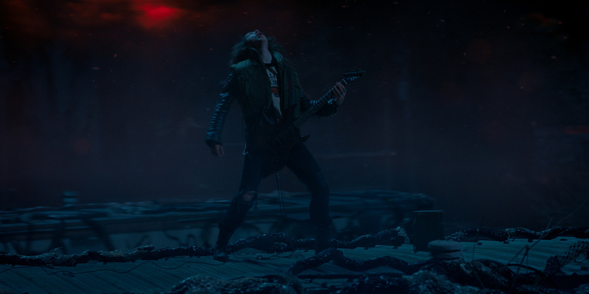 Eddie Munson (Joe Quinn) roaring the rock gods to life to selflessly save the world.