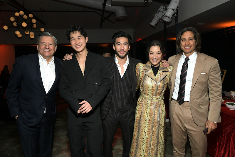 Ted Sarandos, Co-CEO of Netflix, Sam Song Li, Justin Chien, Michelle Yeoh, and Brad Falchuk smile together at a party at Netflix's 'The Brothers Sun' Los Angeles Premiere 