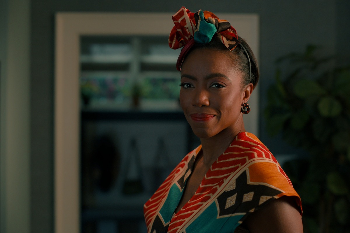 Heather Headley as Helen stands in her home with a slight smile in Season 3 of ‘Sweet Magnolias.’