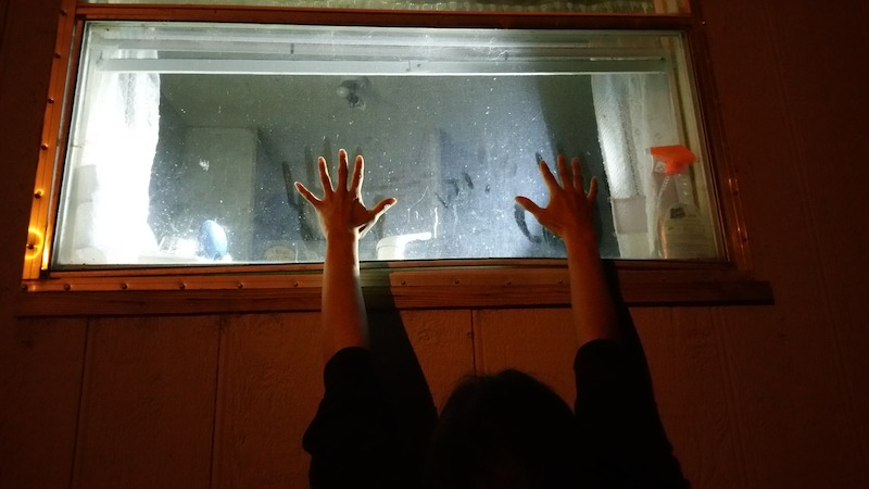 Brenda using her hands to show the scale of the handprint. - Evidence of Bigfoot