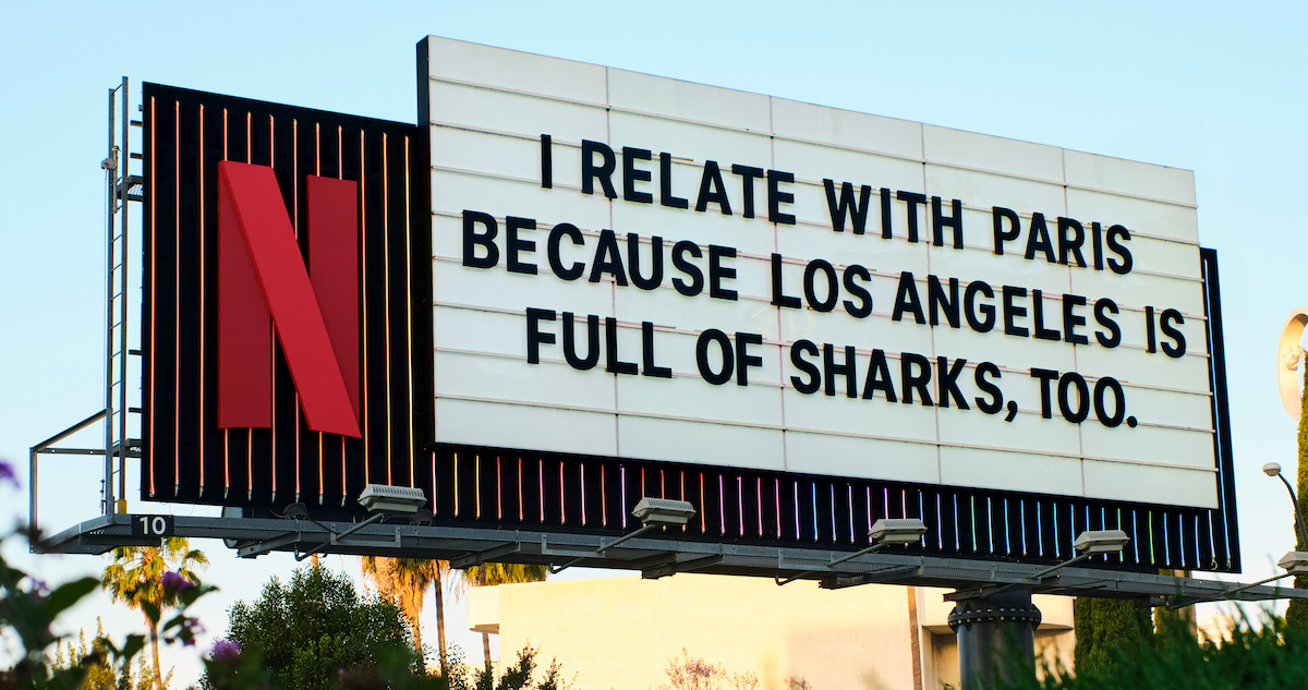 Under Paris Sunset Blvd Marquee - ‘I relate with Paris because Los Angeles is filled with sharks, too.’