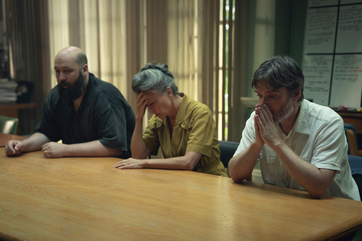 Youssef Kerkour as Owen, Tracey Ullman as Amanda, and Cillian Murphy as Steve sitting at a table.