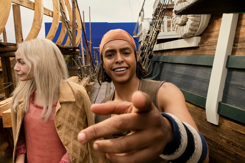 Jacob Romero as Usopp points at the camera on the set of Season 1 of 'One Piece.'