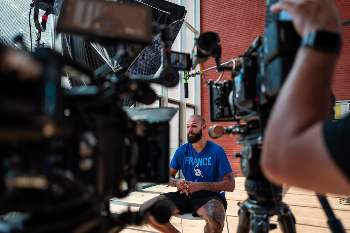 Evan Fournier sits in front of cameras during the filming of ‘Court of Gold’.