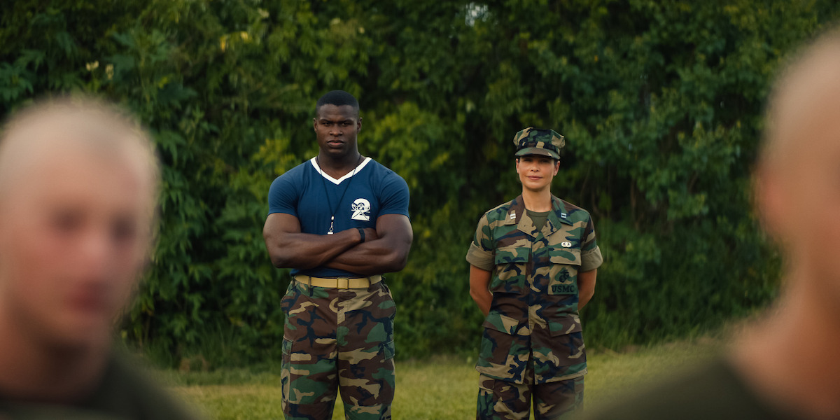Cedrick Cooper as Sgt. McKinnon and Ana Ayora as Captain Fajaro in ‘BOOTS’