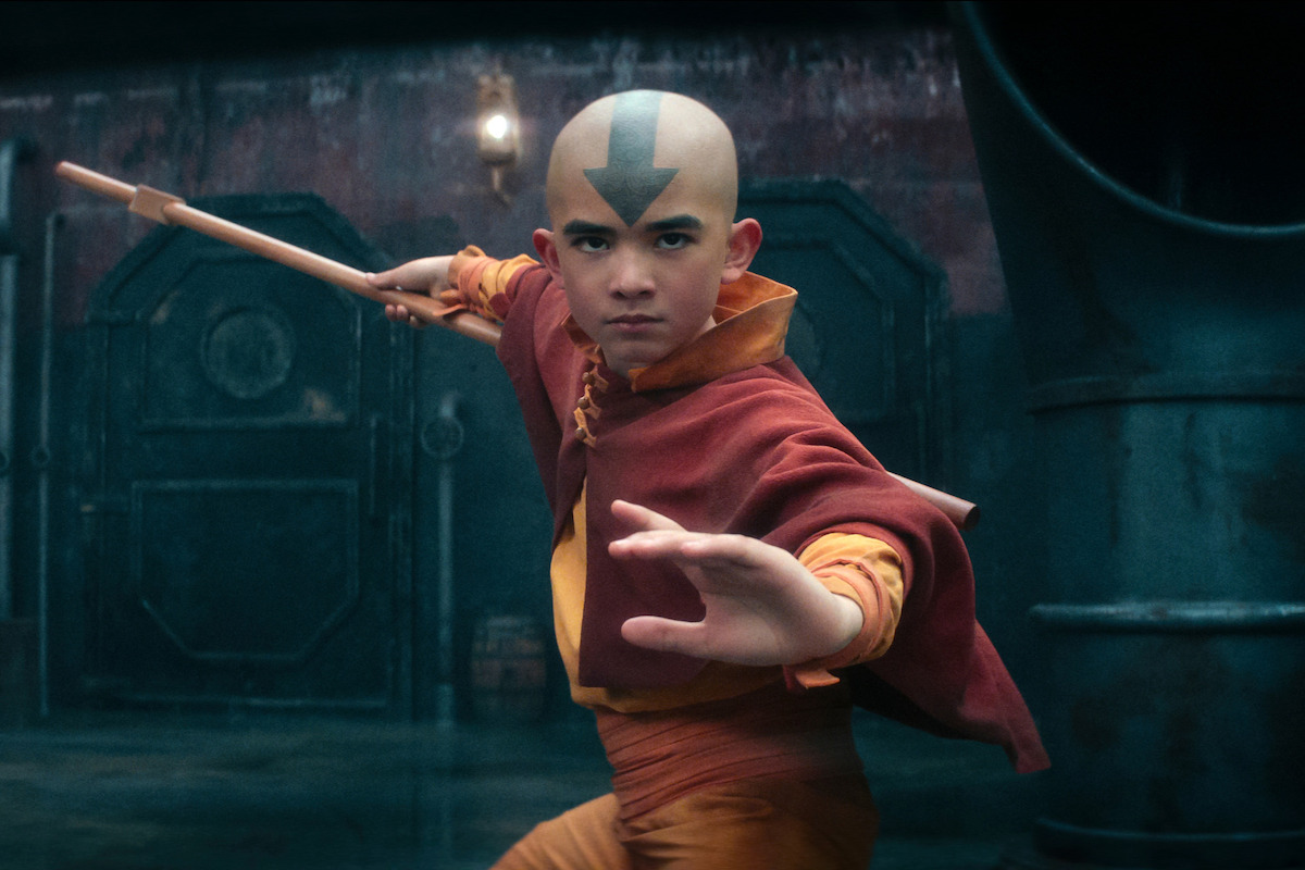 Gordon Cormier as Aang holds his airbending staff in season 1 of ‘Avatar: The Last Airbender’