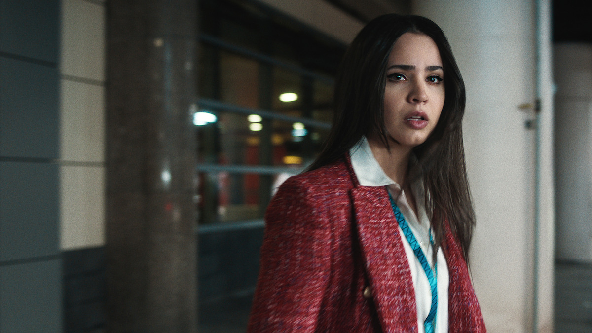 Sofia Carson as Nora Parisi in 'Carry-On'.
