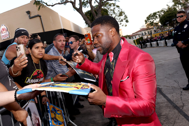 Kevin Hart signs autographs at the Me Time premiere - ‘Me Time’ Red Carpet Photos