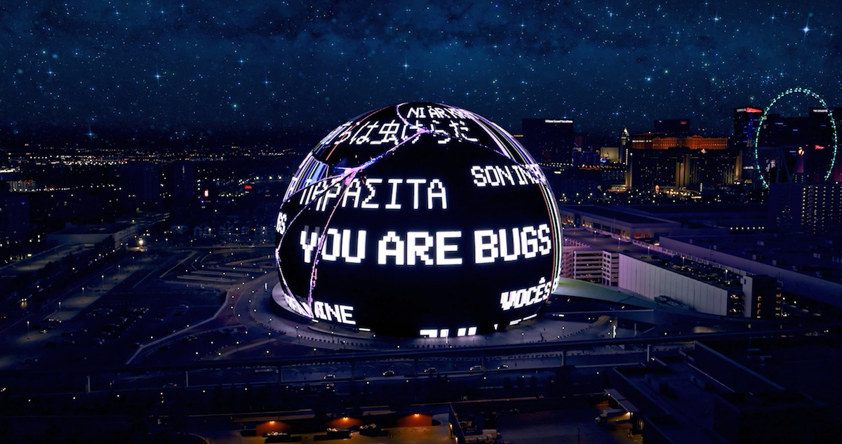 An image of the Las Vegas Sphere with the words 'You Are Bugs' in multiple languages