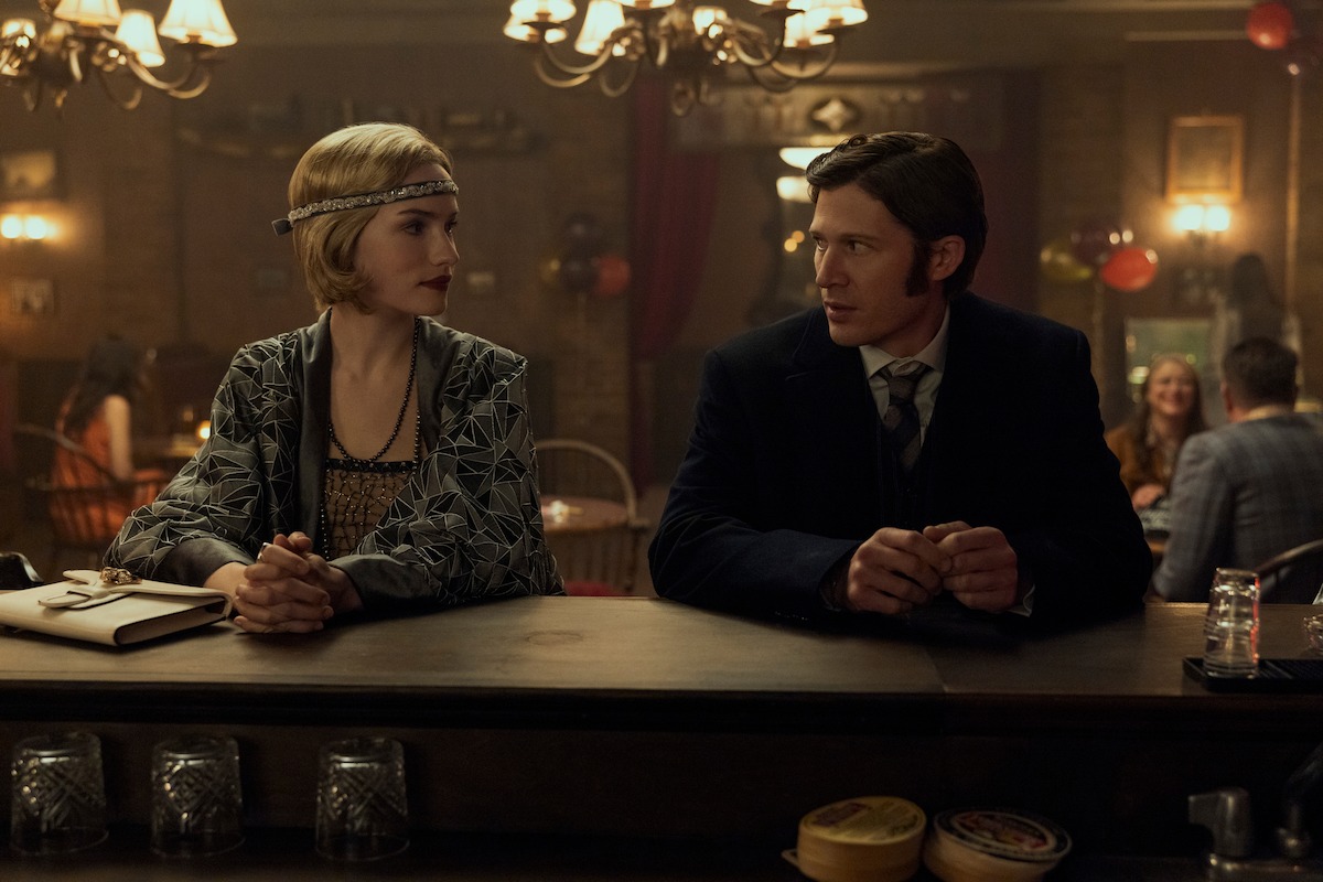 Willa Fitzgerald as Young Madeline, Zach Gilford as Young Roderick in episode 101 of The Fall of the House of Usher.