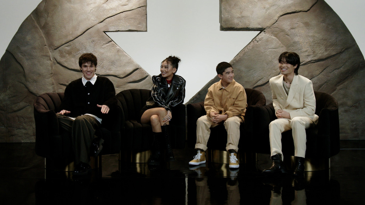 Ian Ousley, Kiawentiio, Gordon Cormier, and Dallas Liu sit on a stage together