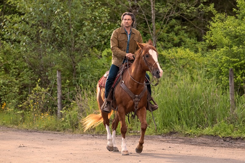 Martin Henderson as Jack Sheridan rides a horse in Season 6 of 'Virgin River'