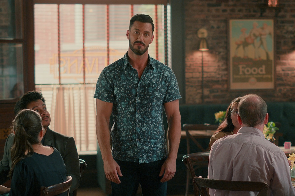 Brandon Quinn as Ronnie stands in the Sullivan’s restaurant dining room in Season 3 of ‘Sweet Magnolias.’