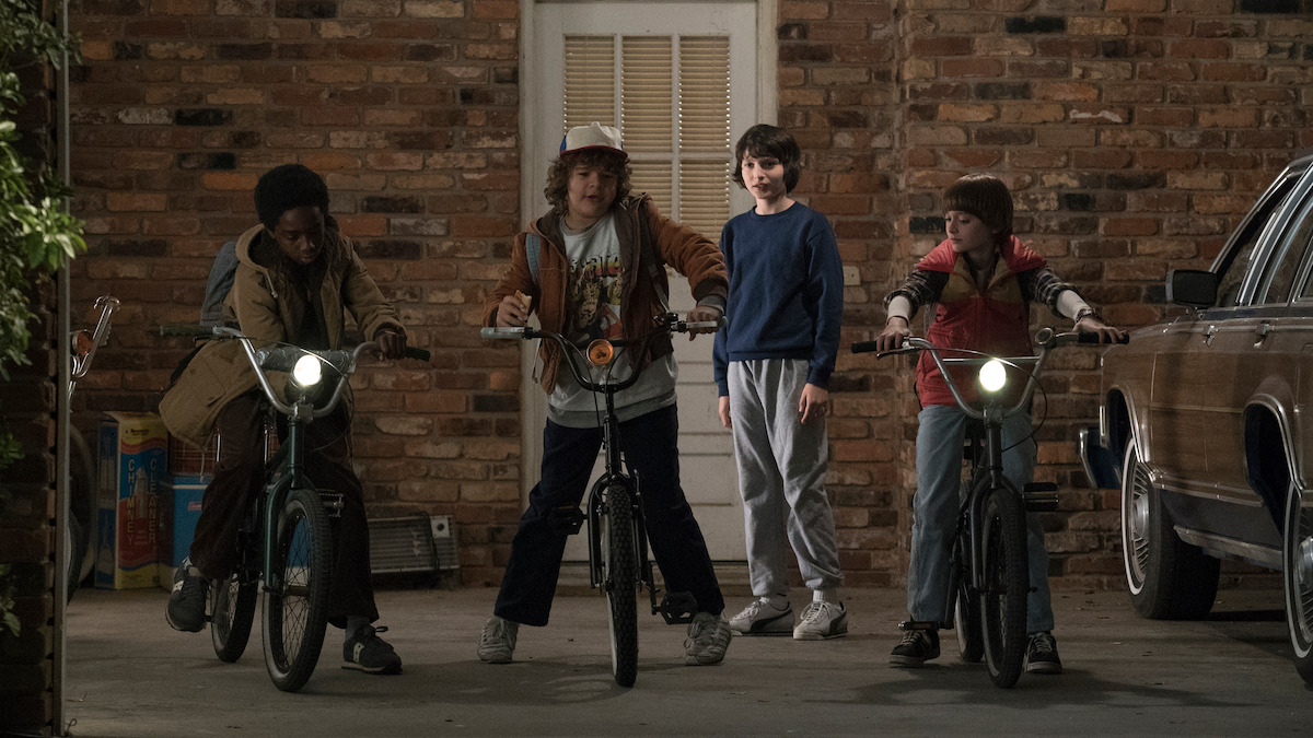 Caleb McLaughlin as Lucas Sinclair, Gaten Matarazzo as Dustin Henderson, Finn Wolfhard as Mike Wheeler, and Noah Schnapp as Will Byers in ‘Stranger Things’ Season 1.