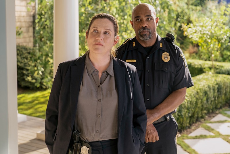 Donna Lynne Champlin as Nikki Henry and Michael Beach as Dan Carter.