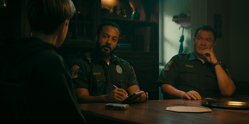 Mae Martin as Alex Dempsey , Brandon Jay McLaren as Dwayne Andrews, and Patrick Gallagher as Chief Bartell in 'Wayward.'
