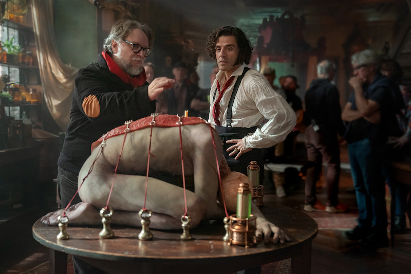  Director Guillermo del Toro and Oscar Issac as Victor Frankenstein on the set of 'Frankenstein.' 