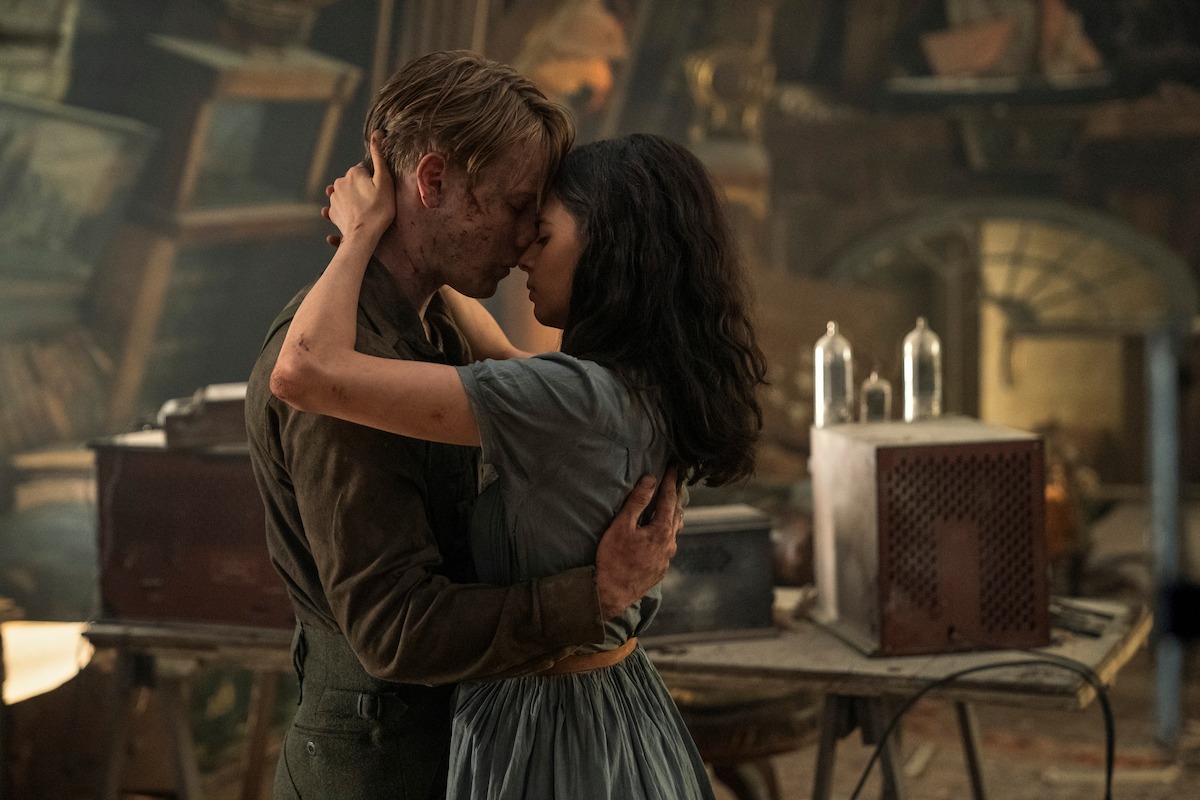 Louis Hofmann as Werner Pfennig, Aria Mia Loberti as Marie-Laure in episode 104 of All the Light We Cannot See.
