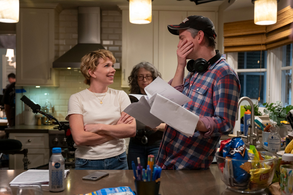 Mary Elizabeth Ellis as Emily and Mike Schur work together on the set of ‘A Man on the Inside’