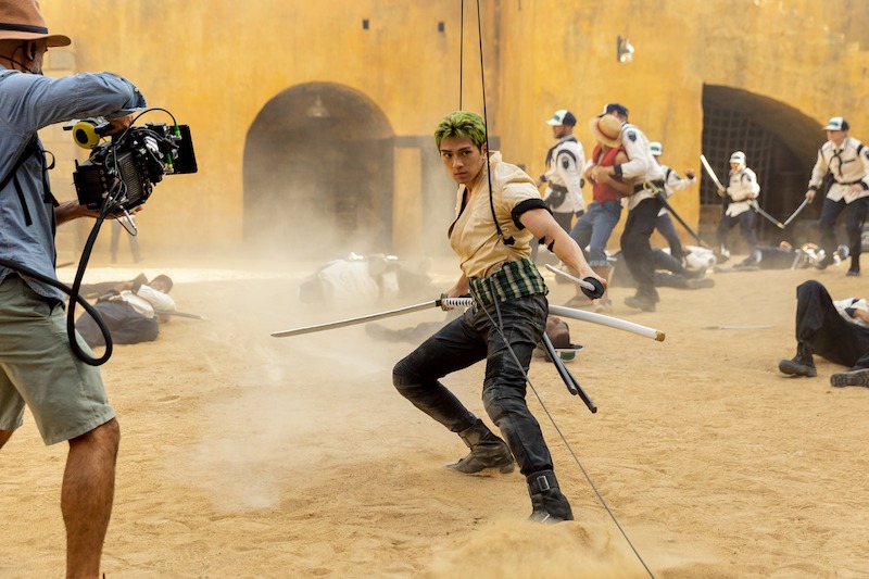 Mackenyu as Roronoa Zoro performs stunts while attached to wired in Season 1 of 'One Piece.'