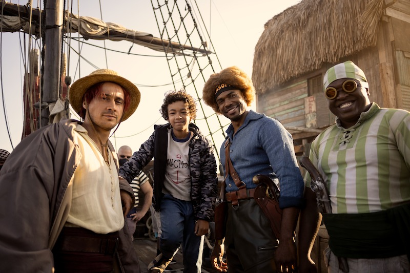 Peter Gadiot as Shanks, Colton Osorio as Young Luffy, Stevel Marc as Yasopp the Great, Ntlanhla Morgan Kutu as Lucky Roux posing for a photo on the set of Season 1 of 'One Piece.'