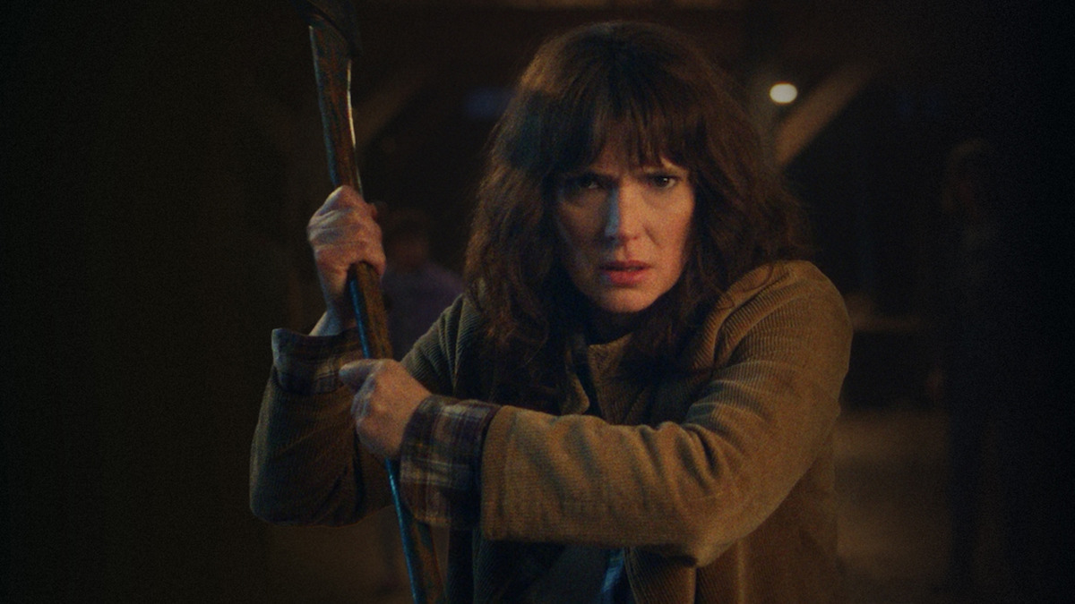 Winona Ryder as Joyce Byers holds an axe in 'Stranger Things 5'