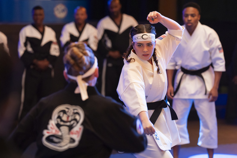 Mary Mouser as Samantha LaRusso fights an opponent in a competition in Season 6, Part 2 of 'Cobra Kai'