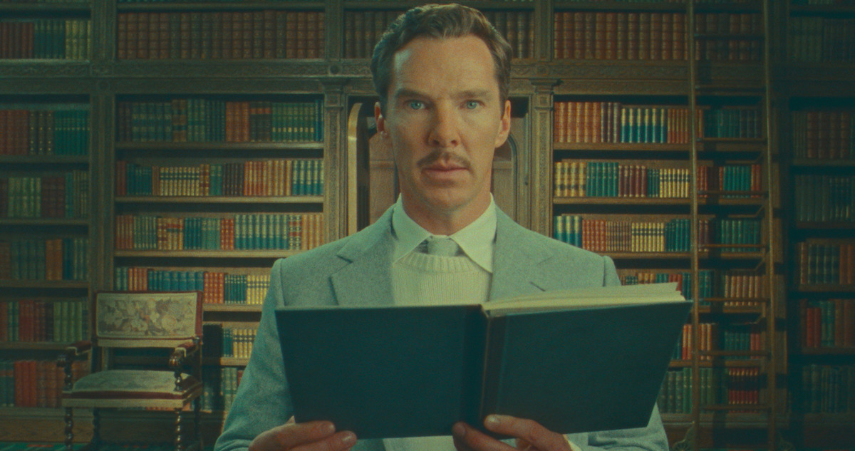 Benedict Cumberbatch reading a book in 'The Wonderful Story of Henry Sugar.'
