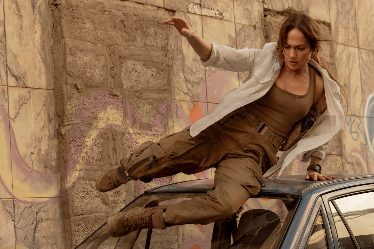 Jennifer Lopez jumps over a car in a still from ‘The Mother.’