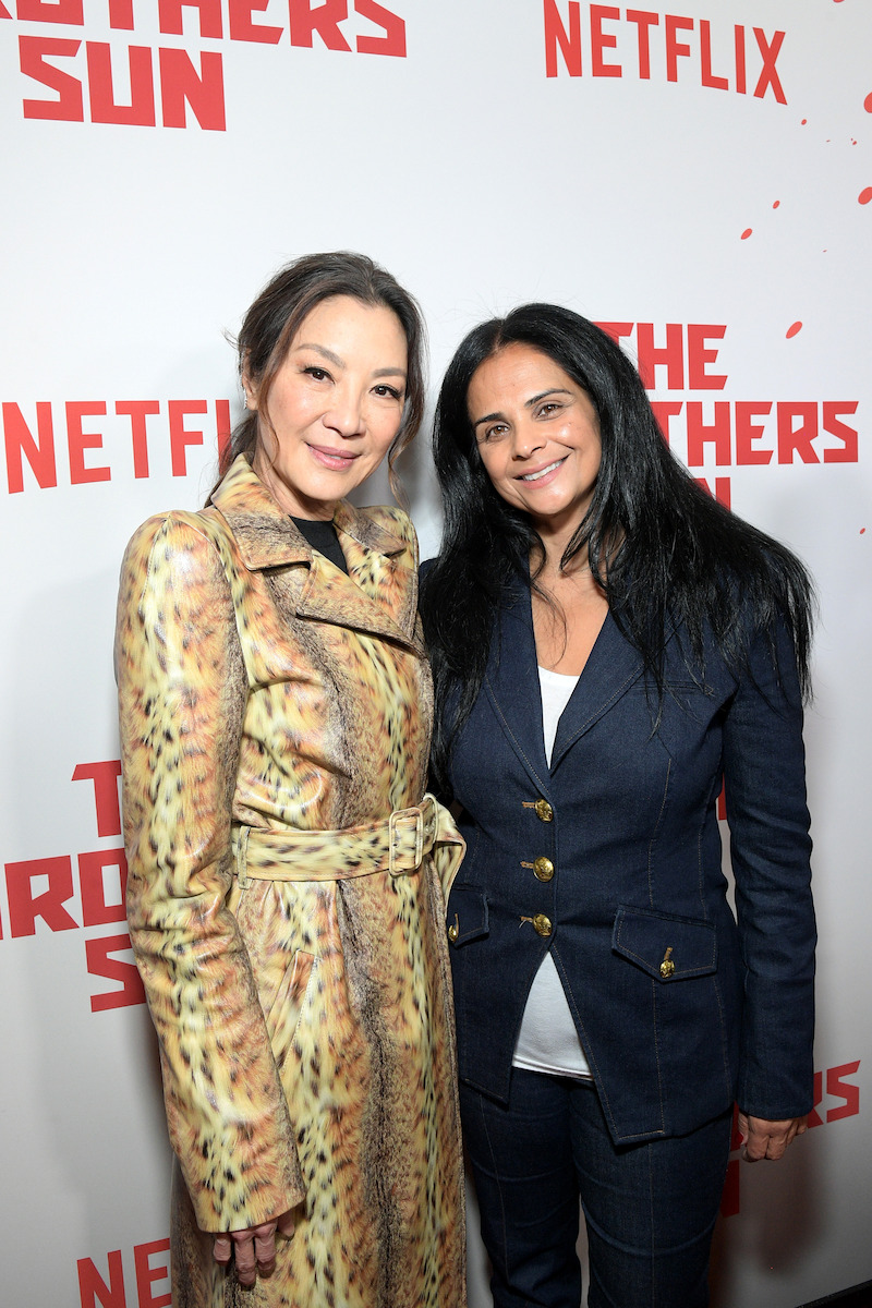 Michelle Yeoh and Bela Bajaria, Chief content officer of Netflix, smile together at Netflix's 'The Brothers Sun' Los Angeles Premiere at Netflix Tudum Theater 