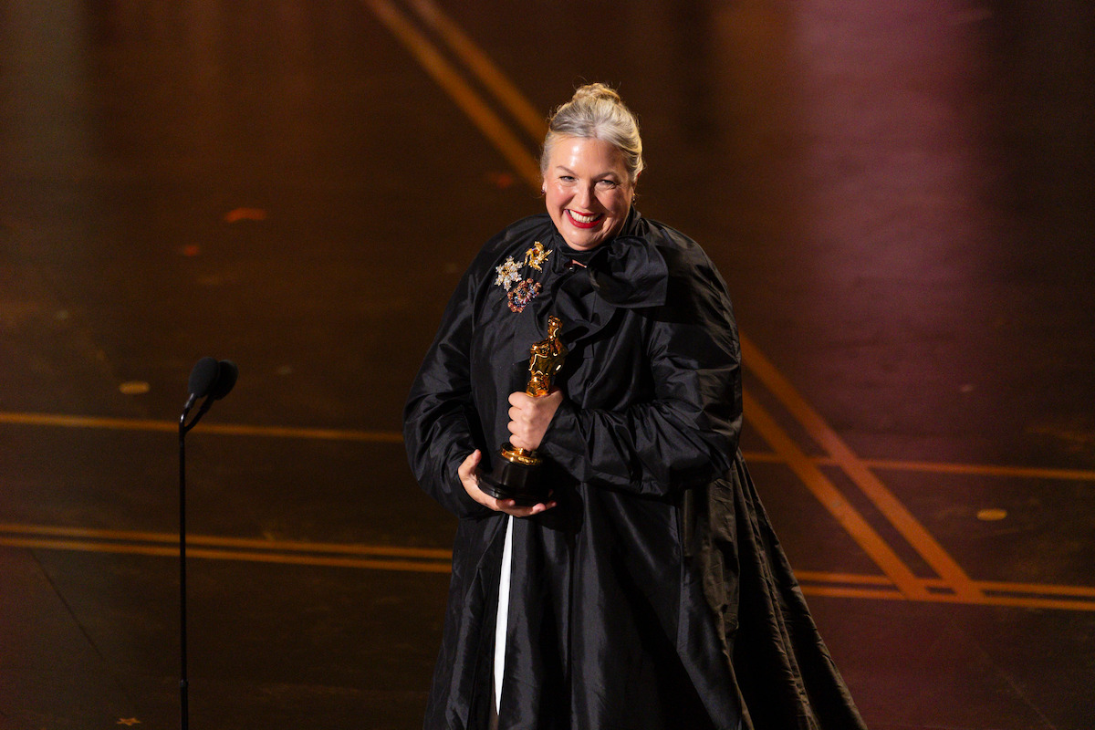 Kate Hawley stands on stage at the 98th Oscars which were held on Sunday, March 15, at the Dolby® Theatre at Ovation Hollywood in Los Angeles, California.