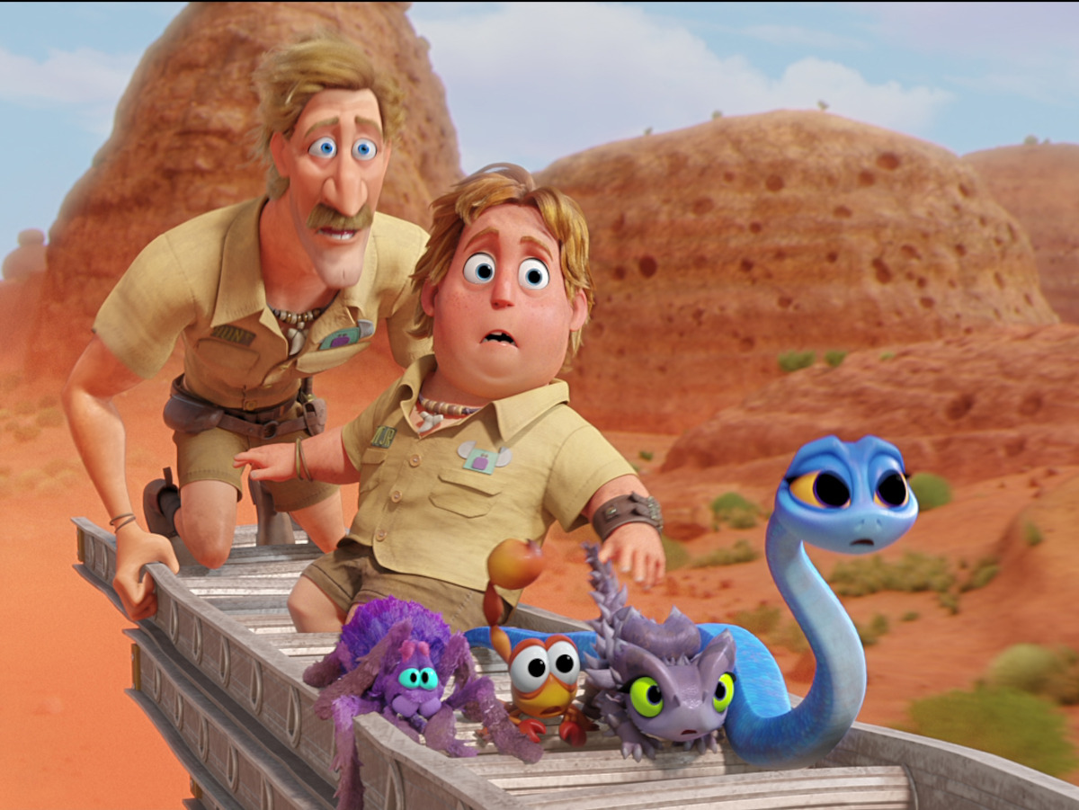 Zoo keeper has the critters in his wheelbarrow in Back to the Outback