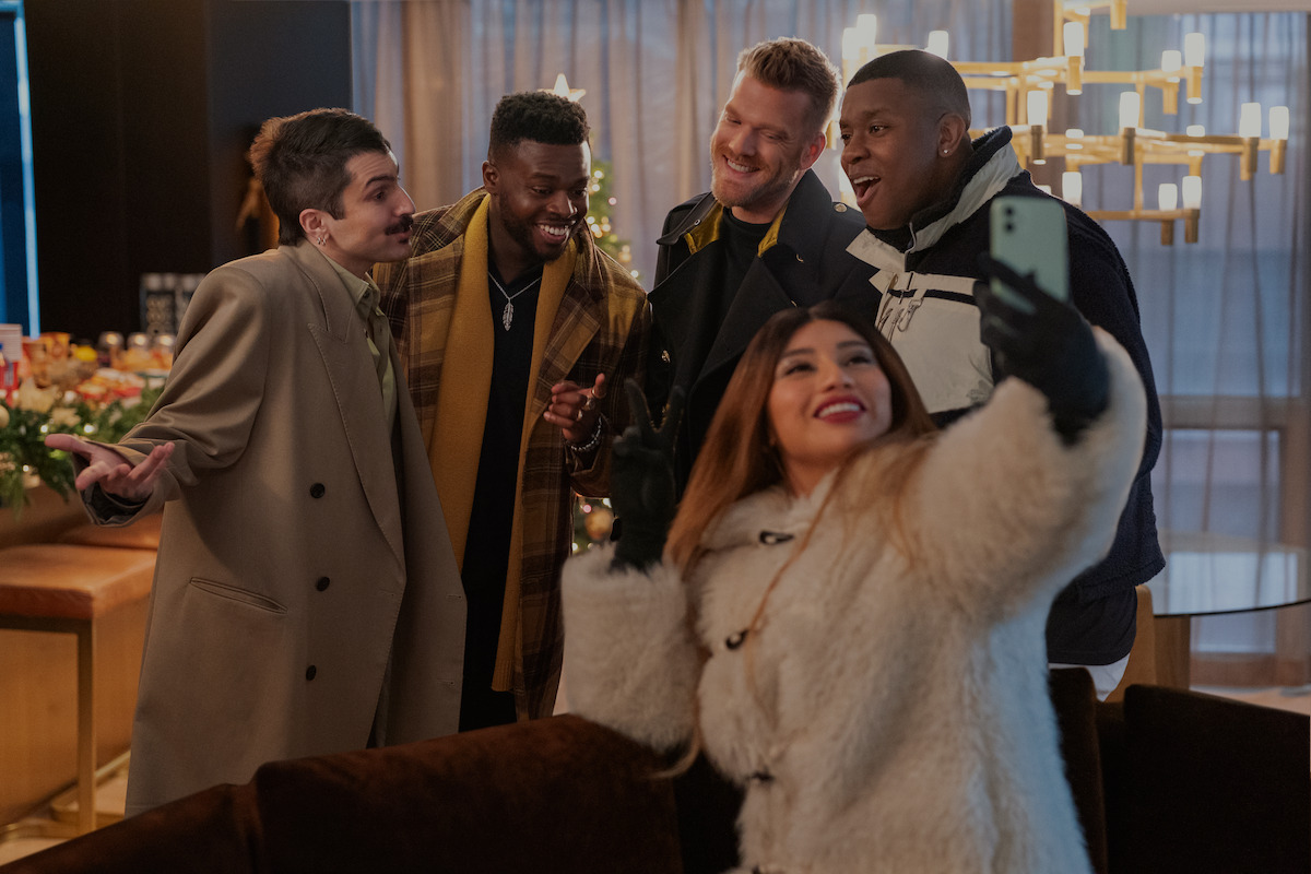 Mitch Grassi as Mitch, Kevin Olusola as Kevin, Scott Hoying as Scott, Matt Sallee as Matt, and Kirstin Maldonado as Kirstin of Pentatonix in ‘Meet Me Next Christmas’