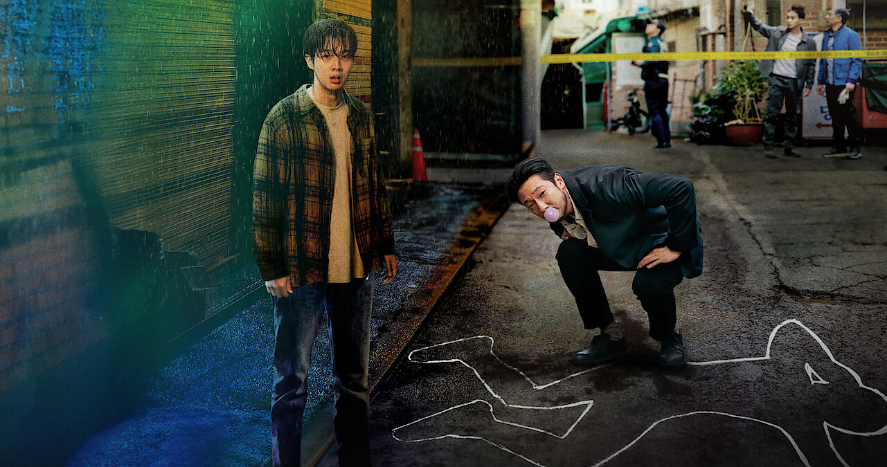 Choi Woo-shik as Lee Tang and Son Suk-ku as Jang Nan-gam stand together at a crime scene in Season 1 of 'A Killer Paradox'
