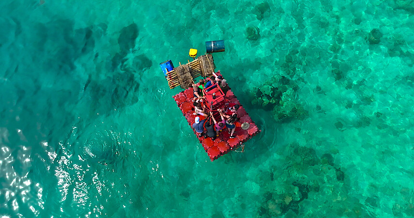 The contestants from 'The Mole' Season 2 on a raft.