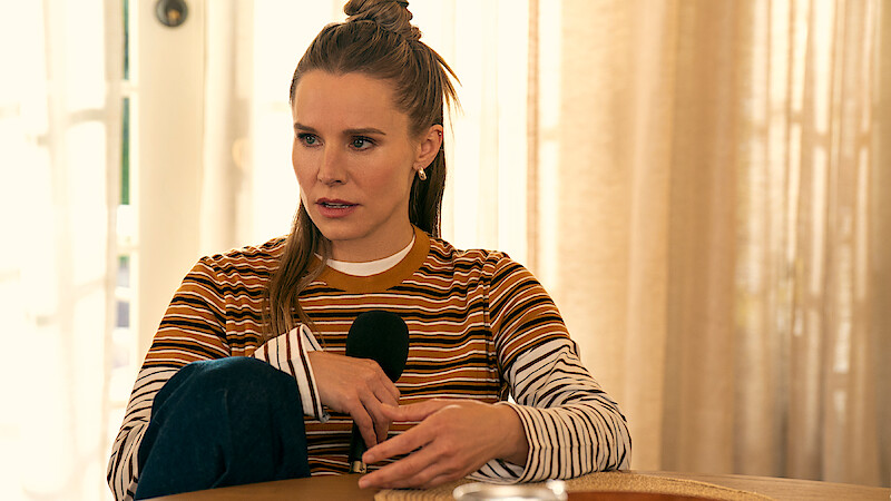 Kristen Bell as Joanne holds a microphone in 'Nobody Wants This' Season 2.